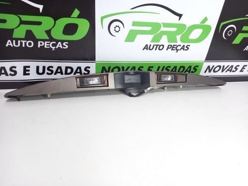 Friso Tampa Traseira Com Luz Placa Nissan Versa 2015 A 2020 Original Usado